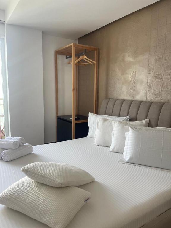 Postel nebo postele na pokoji v ubytování Hotel Adria