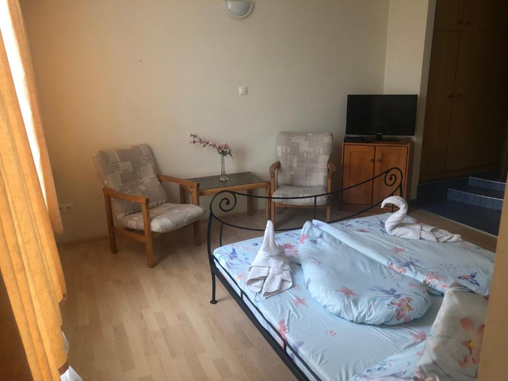TV a/nebo společenská místnost v ubytování City Hotel Siófok