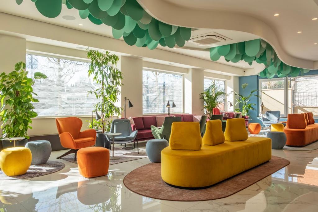 Posezení v ubytování Adesso Hotel