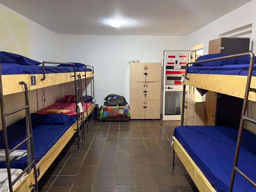 Letto o letti in una camera di Milingona City Center Hostel