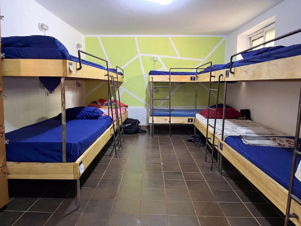 Letto o letti in una camera di Milingona City Center Hostel