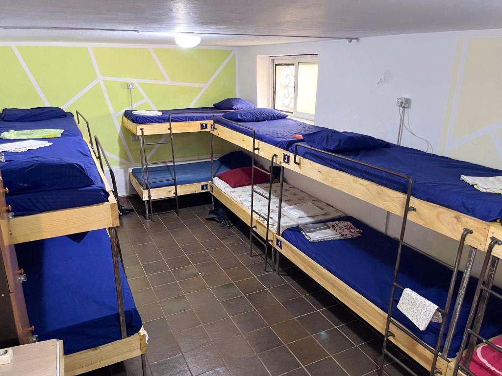 Letto o letti in una camera di Milingona City Center Hostel