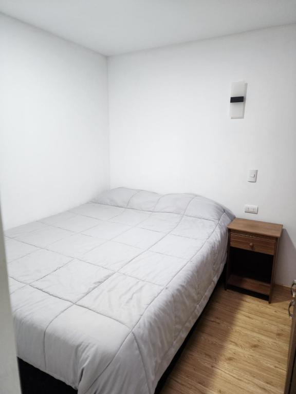 Postel nebo postele na pokoji v ubytování Nui apartamento
