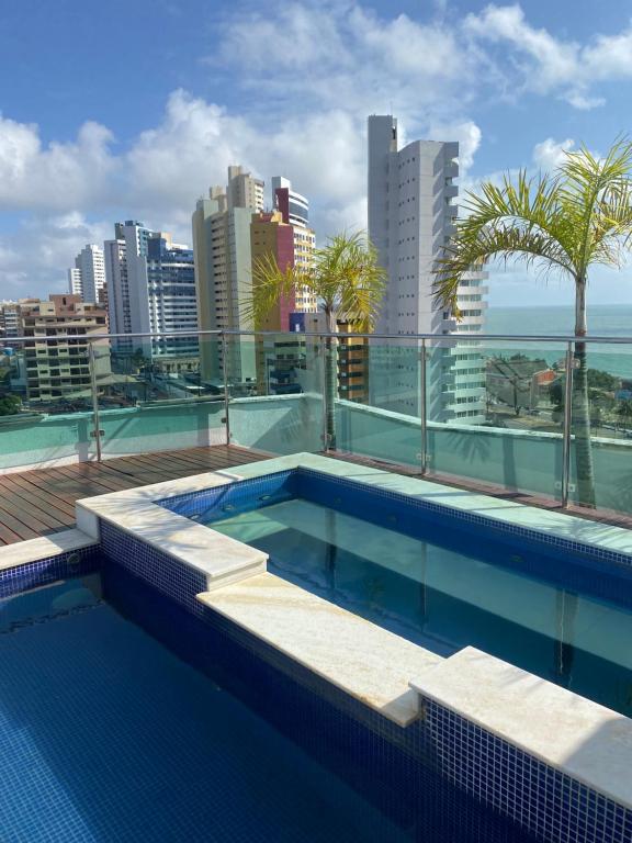 Apartamento Duplex Vista Mar em Natal tesisinde veya buraya yakın yüzme havuzu