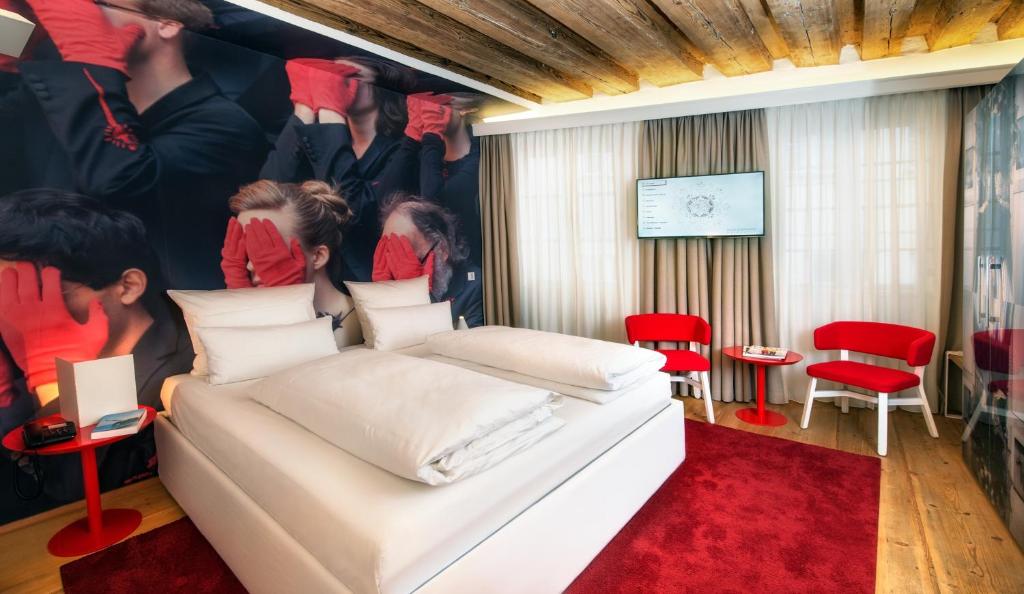 Postel nebo postele na pokoji v ubytování Small Luxury Hotel Goldgasse