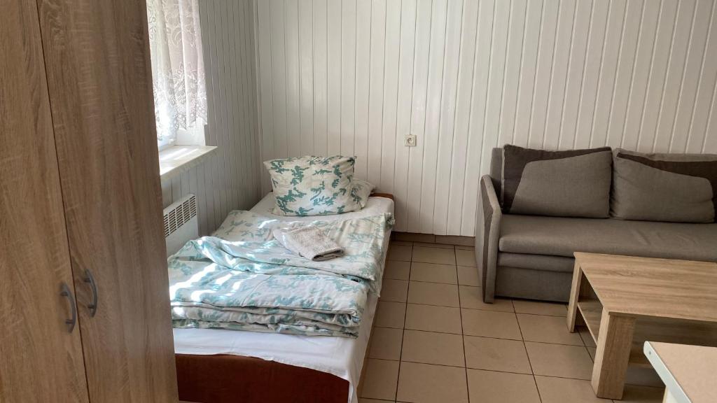 Postel nebo postele na pokoji v ubytování Kemping Obora
