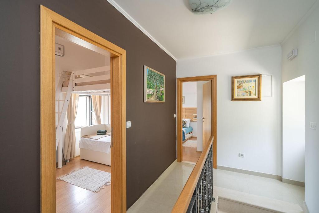 Posteľ alebo postele v izbe v ubytovaní Holiday Home Majkovi