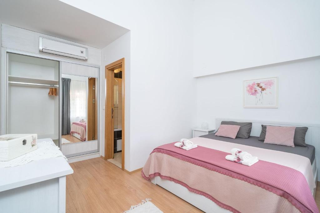 Posteľ alebo postele v izbe v ubytovaní Holiday Home Majkovi