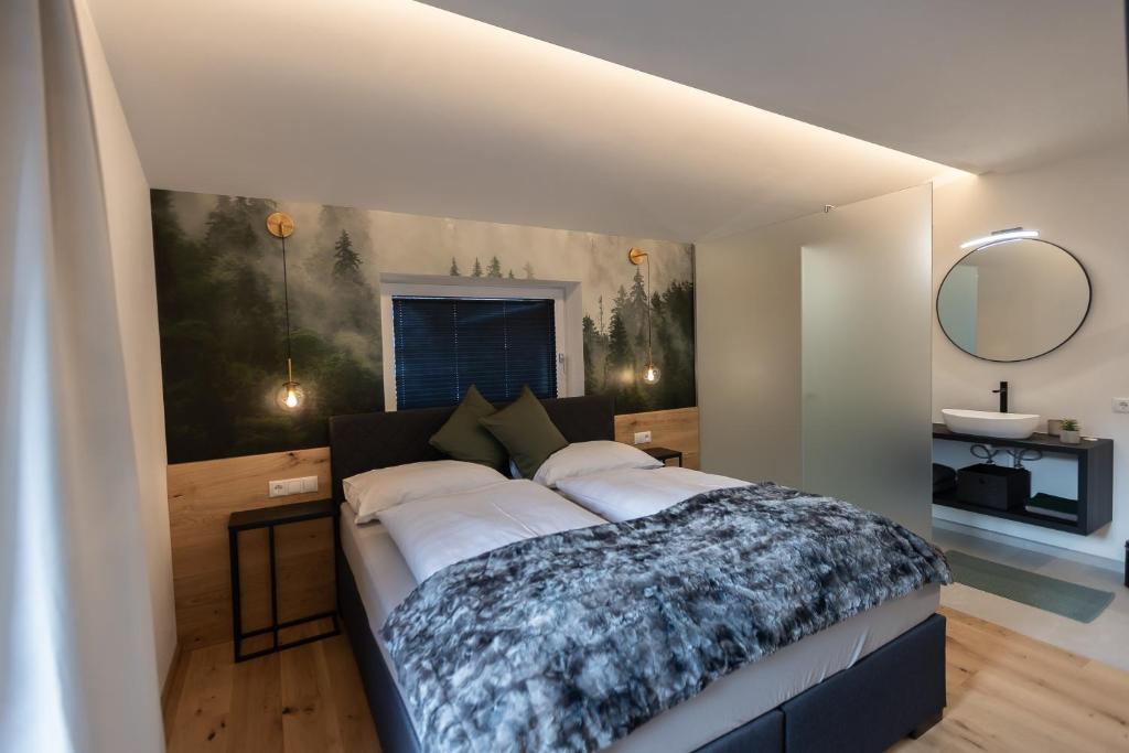 Postel nebo postele na pokoji v ubytování Landhaus Riepler