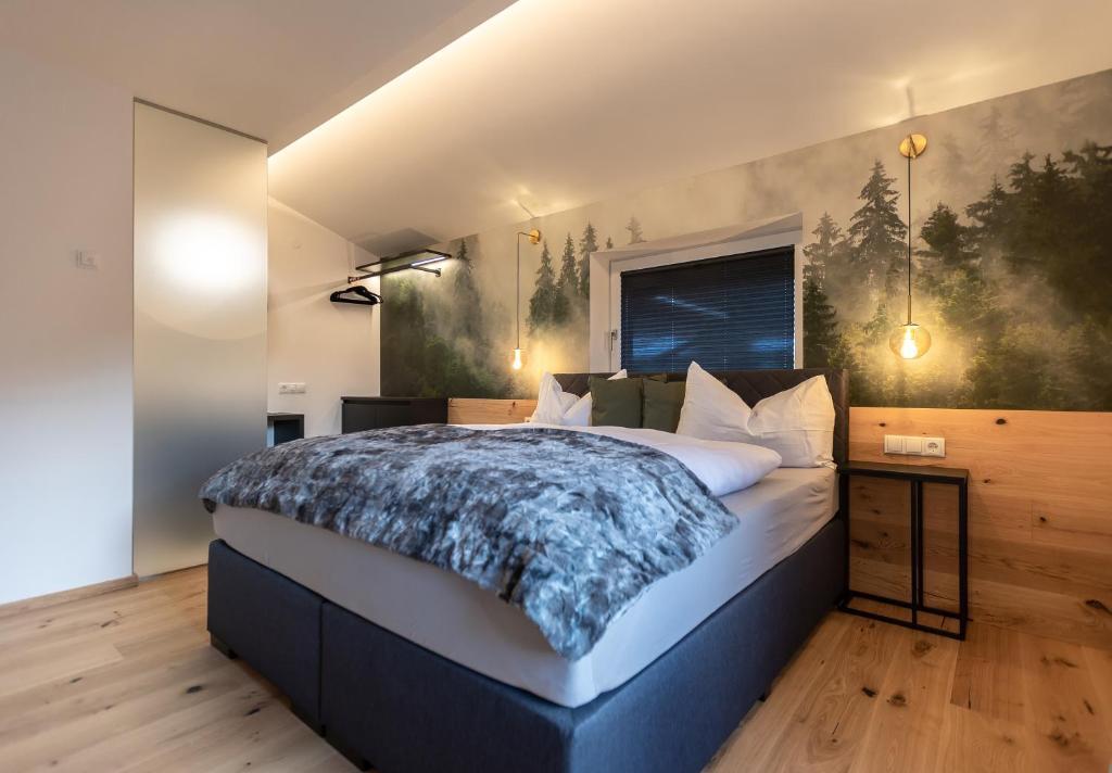 Postel nebo postele na pokoji v ubytování Landhaus Riepler