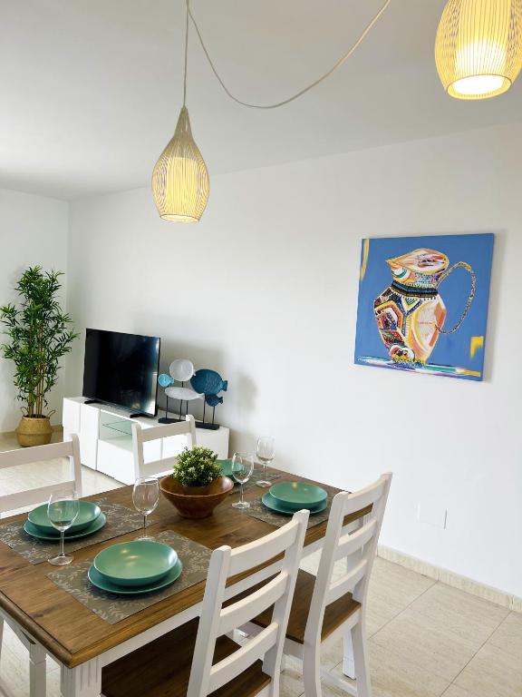 TV a/nebo společenská místnost v ubytování LOS CHARCOS TERRACE VIEW