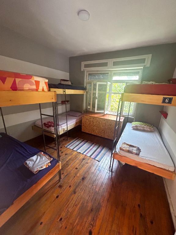 Letto o letti in una camera di Milingona City Center Hostel