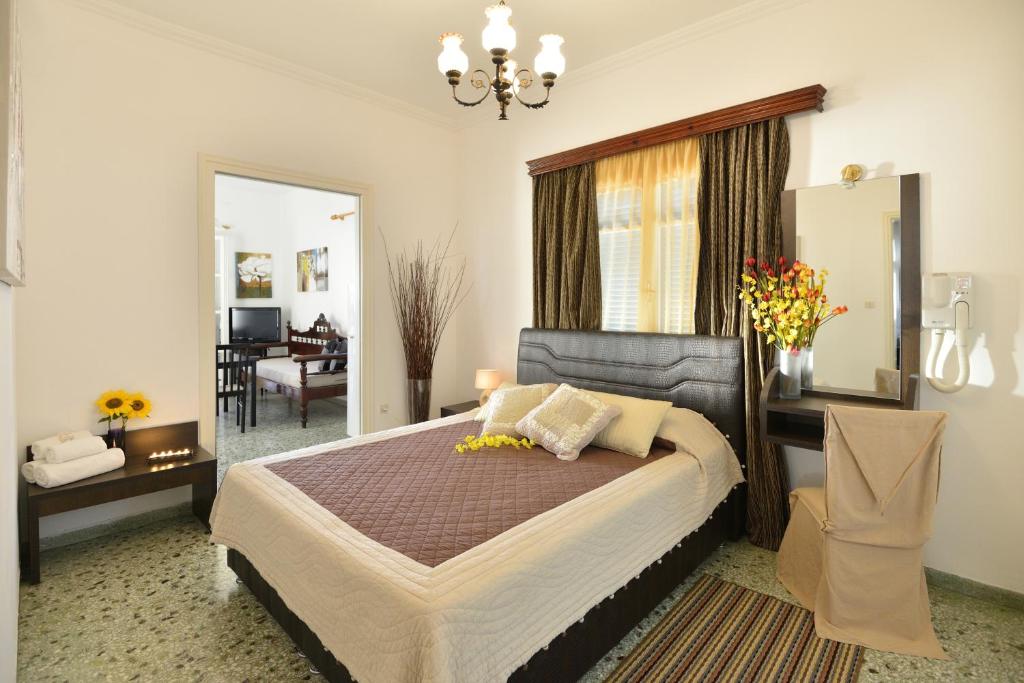 Postel nebo postele na pokoji v ubytování Hotel Nazos 1