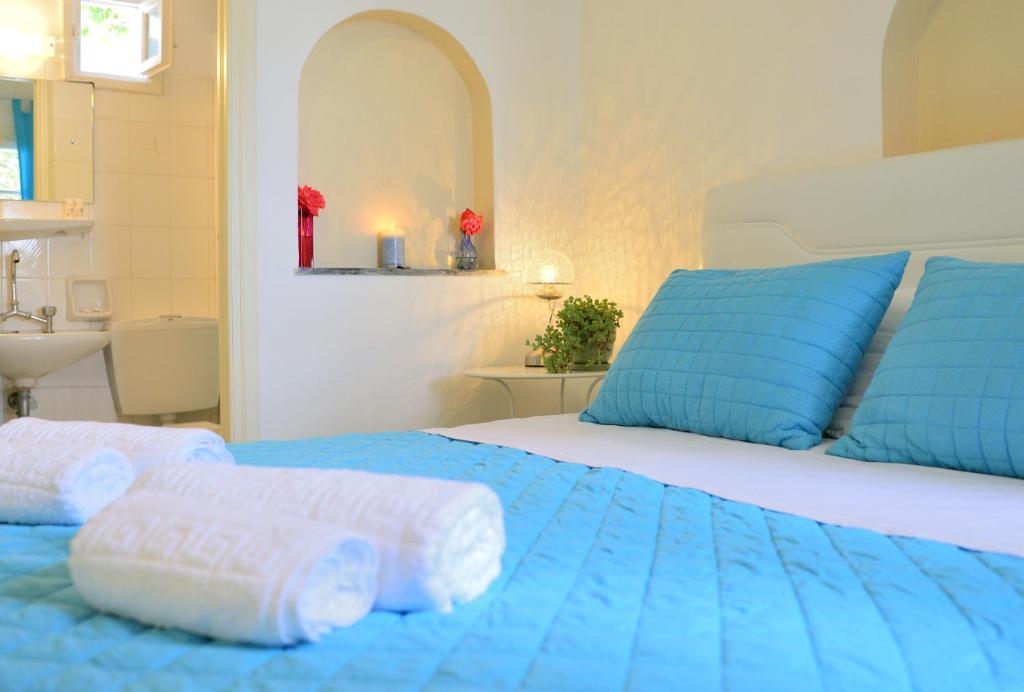 Postel nebo postele na pokoji v ubytování Hotel Nazos 1