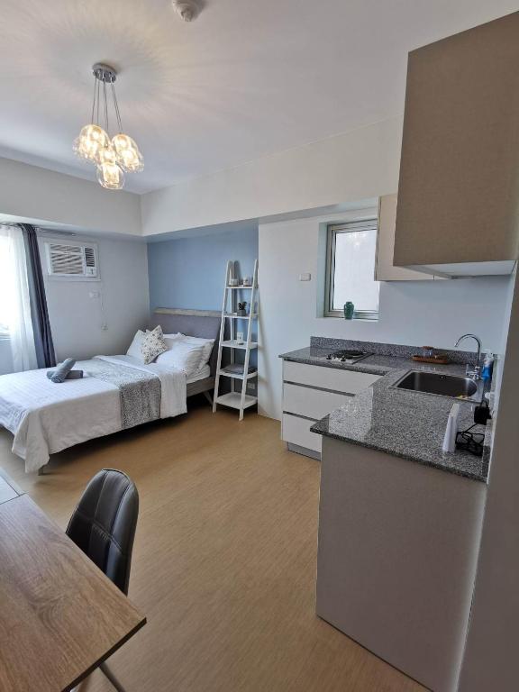 Postel nebo postele na pokoji v ubytování Avida Davao by davaobnb & Lemonique Homes