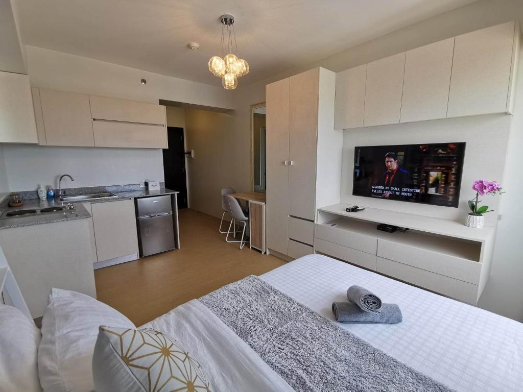 Kuchyň nebo kuchyňský kout v ubytování Avida Davao by davaobnb & Lemonique Homes