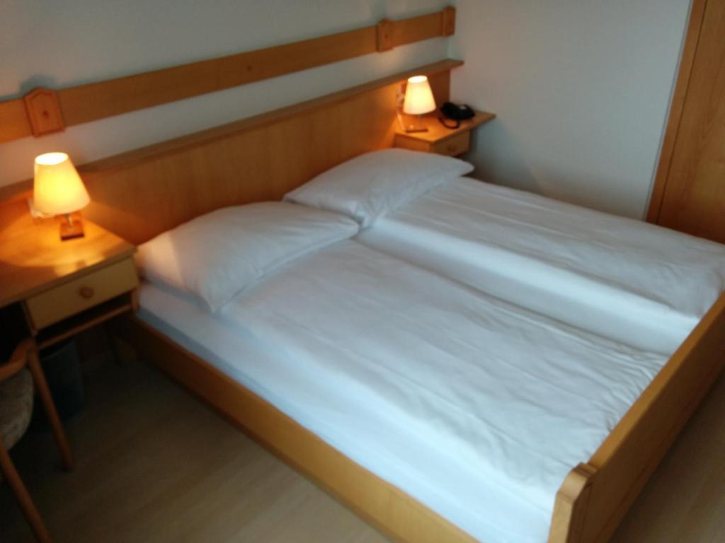 Posteľ alebo postele v izbe v ubytovaní Hotel Terminus