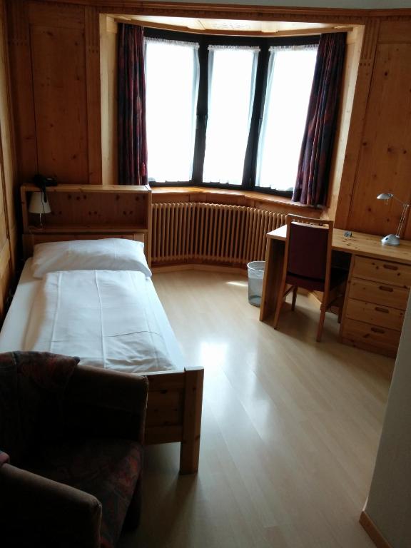 Posteľ alebo postele v izbe v ubytovaní Hotel Terminus