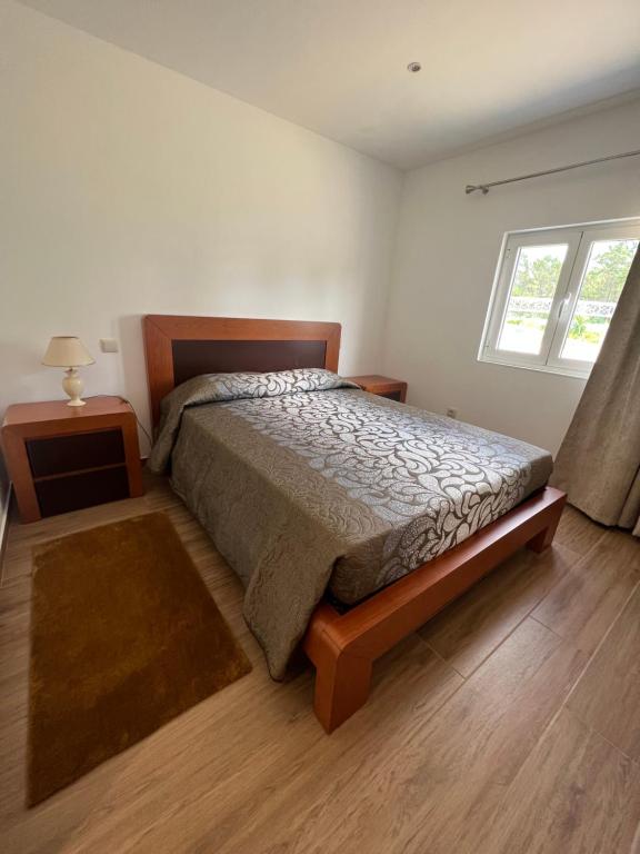 Postel nebo postele na pokoji v ubytování Funileiro, apartamentos e quartos