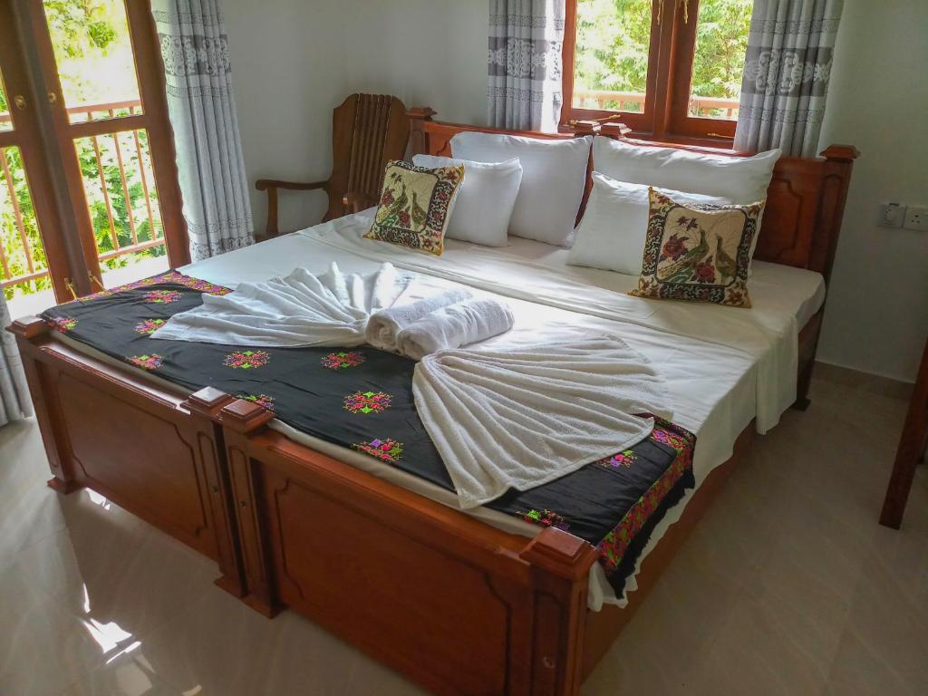 Postel nebo postele na pokoji v ubytování Rock Edge Residence
