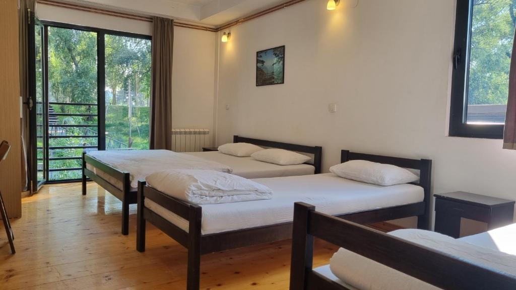 Postel nebo postele na pokoji v ubytování B&B Botel Charlie