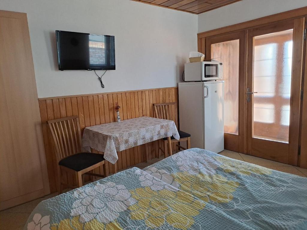 Postel nebo postele na pokoji v ubytování Jiřinka