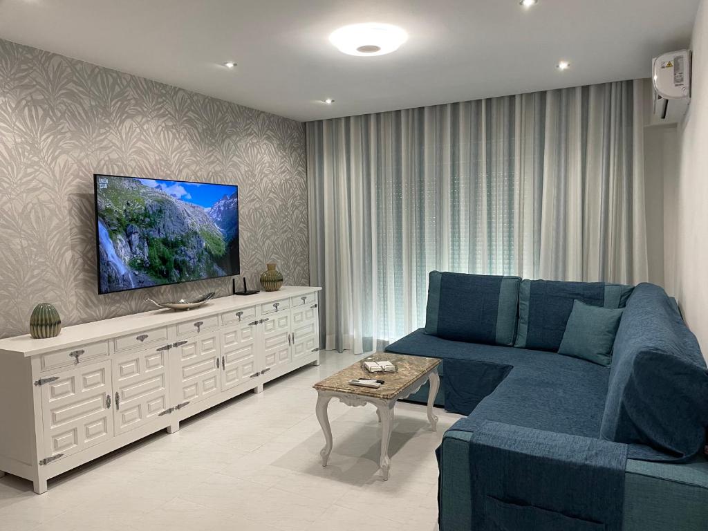 Posezení v ubytování La Fuente apartamento con 3 AC