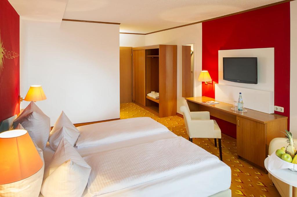 TV a/nebo společenská místnost v ubytování ACHAT Hotel Frankfurt Maintal
