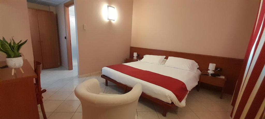 Posteľ alebo postele v izbe v ubytovaní Hotel Ceretto