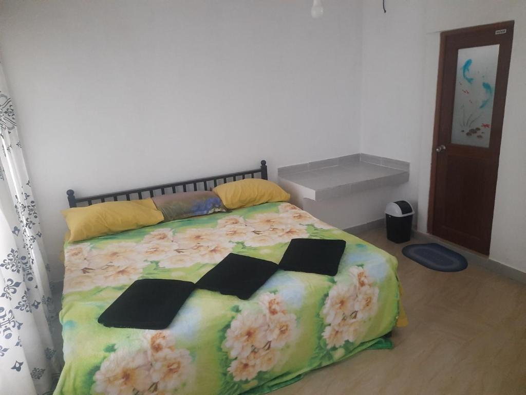 Postel nebo postele na pokoji v ubytování Gagana Villa