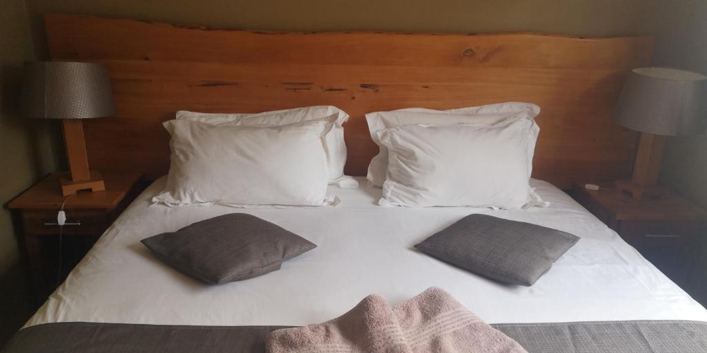 Postel nebo postele na pokoji v ubytování Nukakamma Guest House