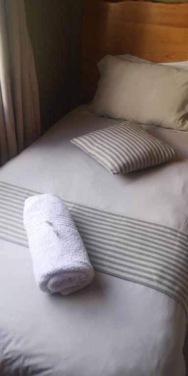 Postel nebo postele na pokoji v ubytování Nukakamma Guest House