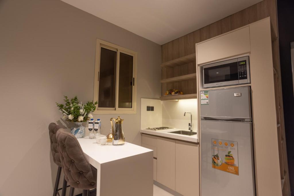Kuchyň nebo kuchyňský kout v ubytování skyline Hotel & Suites