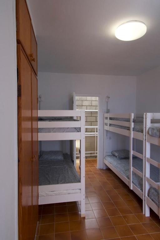 Postel nebo postele na pokoji v ubytování Las Eras Nest Hostel