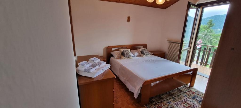 Postel nebo postele na pokoji v ubytování Corte Toffoletti