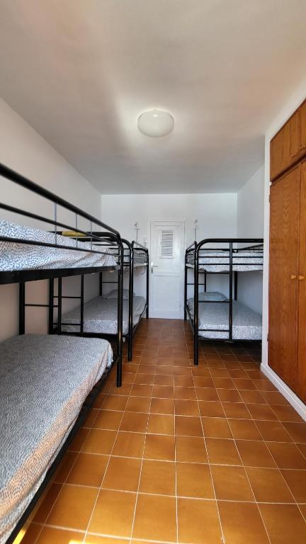 Postel nebo postele na pokoji v ubytování Las Eras Nest Hostel
