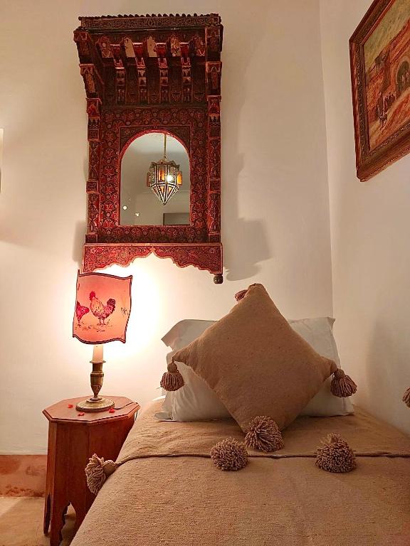 Postel nebo postele na pokoji v ubytování Riad Le Coq Berbère