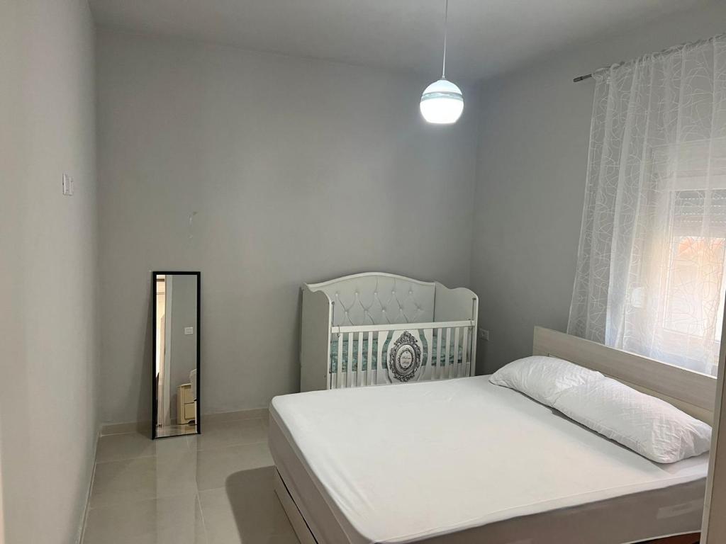 Postel nebo postele na pokoji v ubytování Twins Apartment