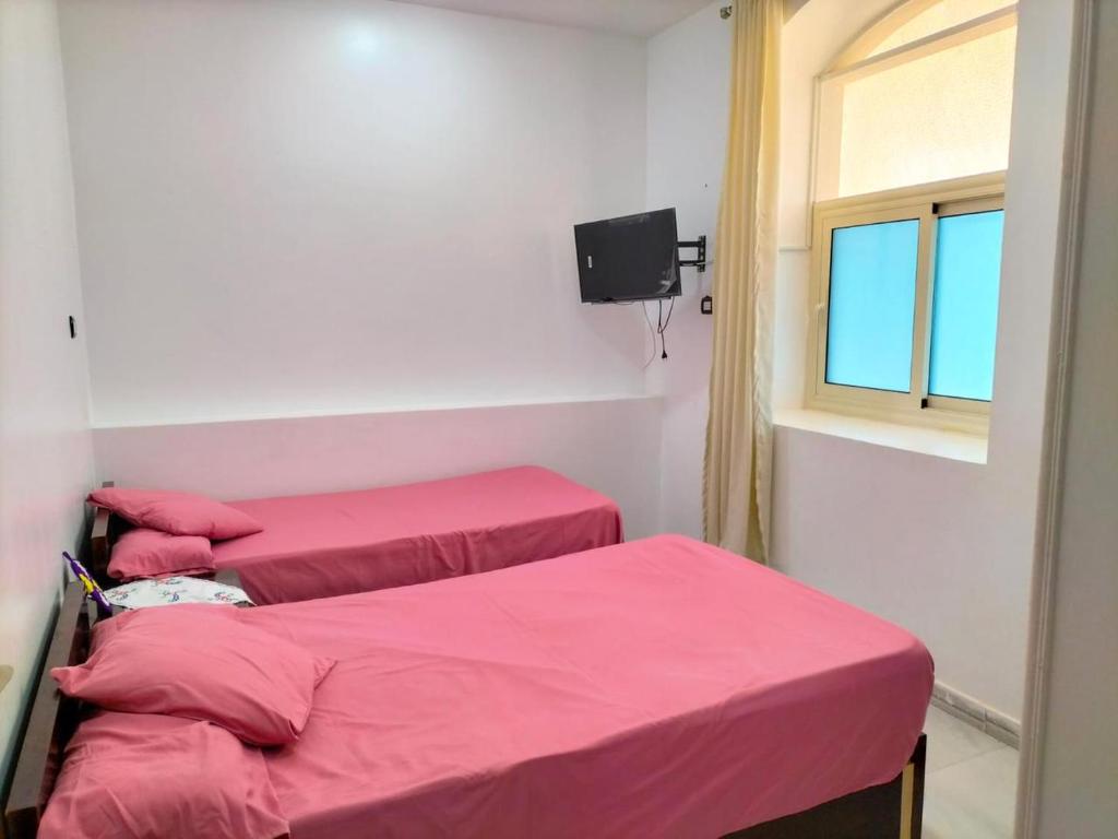Postel nebo postele na pokoji v ubytování ANA-KA Guest house