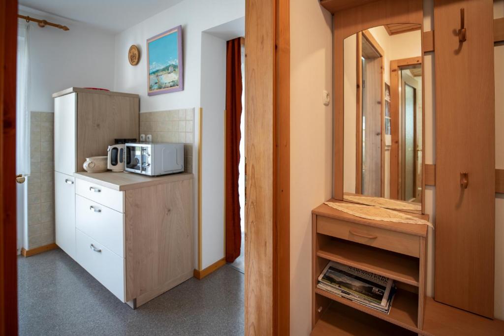 Kuchyň nebo kuchyňský kout v ubytování Apartmaji Colja
