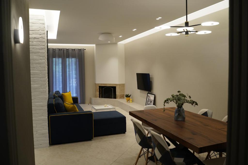 TV a/nebo společenská místnost v ubytování Grand View Suites Meteora