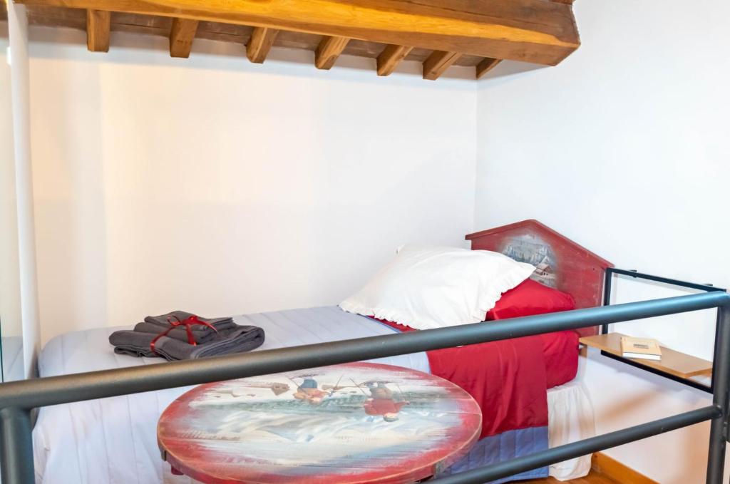 Postel nebo postele na pokoji v ubytování Palazzo NiTe