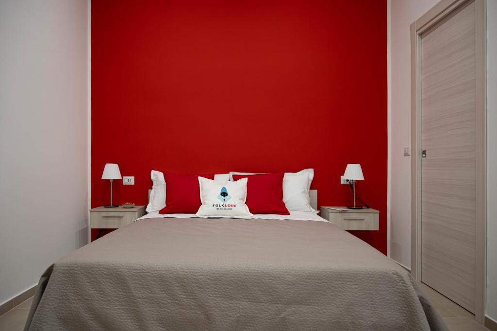 Postel nebo postele na pokoji v ubytování Folklore B&B