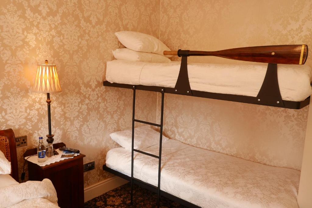 Postel nebo postele na pokoji v ubytování Ghan House