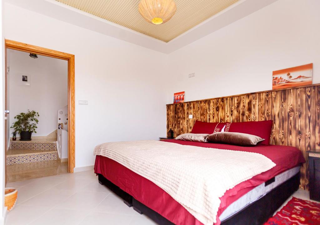 Postel nebo postele na pokoji v ubytování Atlantic Vibes Surf Hostel