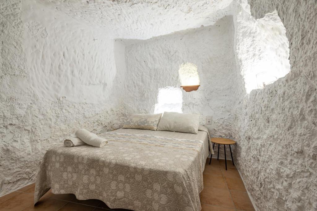 Postel nebo postele na pokoji v ubytování Casa rural el palomar del Júcar