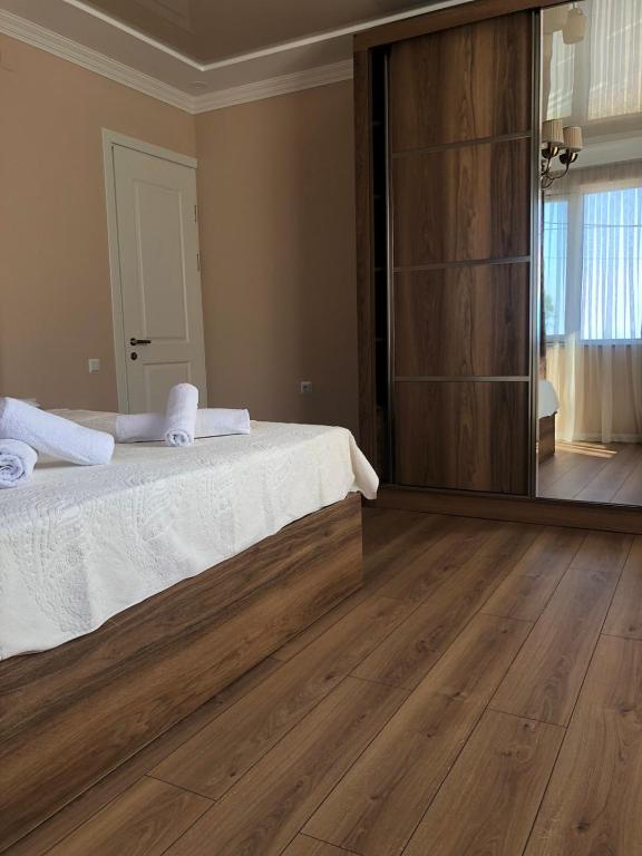 Postel nebo postele na pokoji v ubytování Guest House Bagrationi