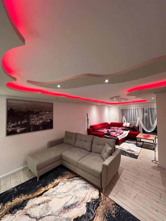 Postel nebo postele na pokoji v ubytování The Port Ferienwohnung