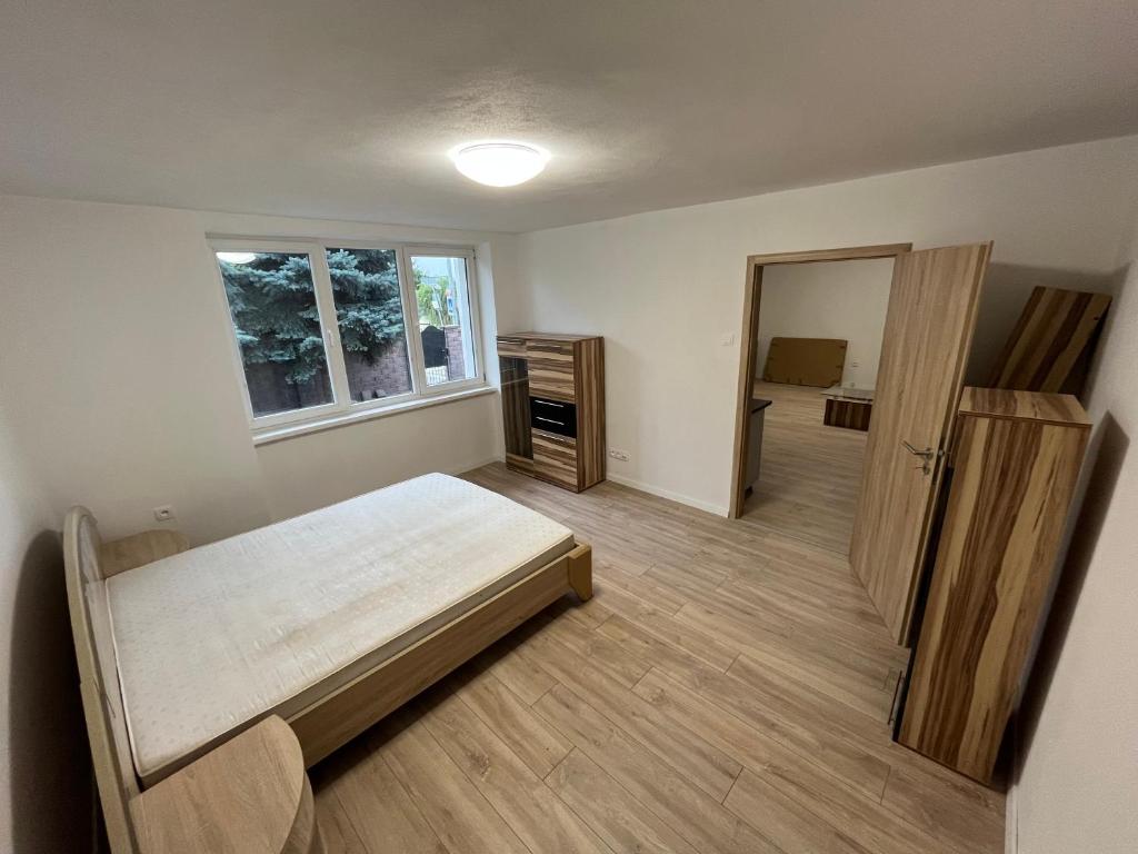 Ein Bett oder Betten in einem Zimmer der Unterkunft Apartman 2 na Hlavnej ulici, Veľké Úľany