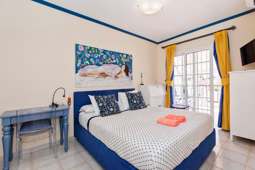 Postel nebo postele na pokoji v ubytování Penthouse El Mirador Los Cristianos Tenerife - VV